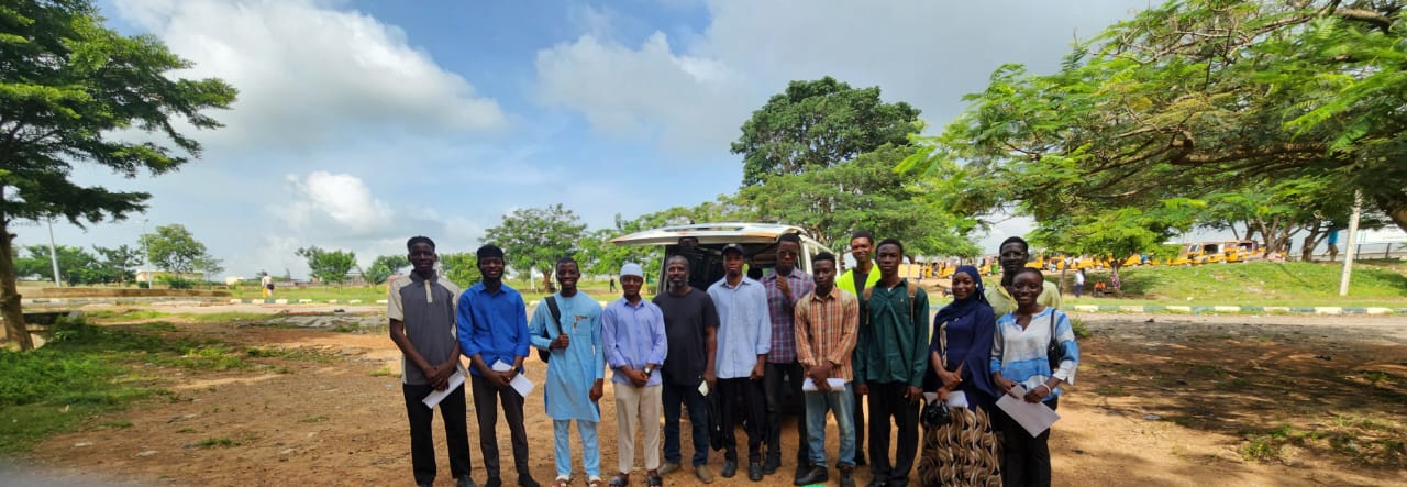 University of Abuja engineering students conducting a community needs assessment in Gaba
